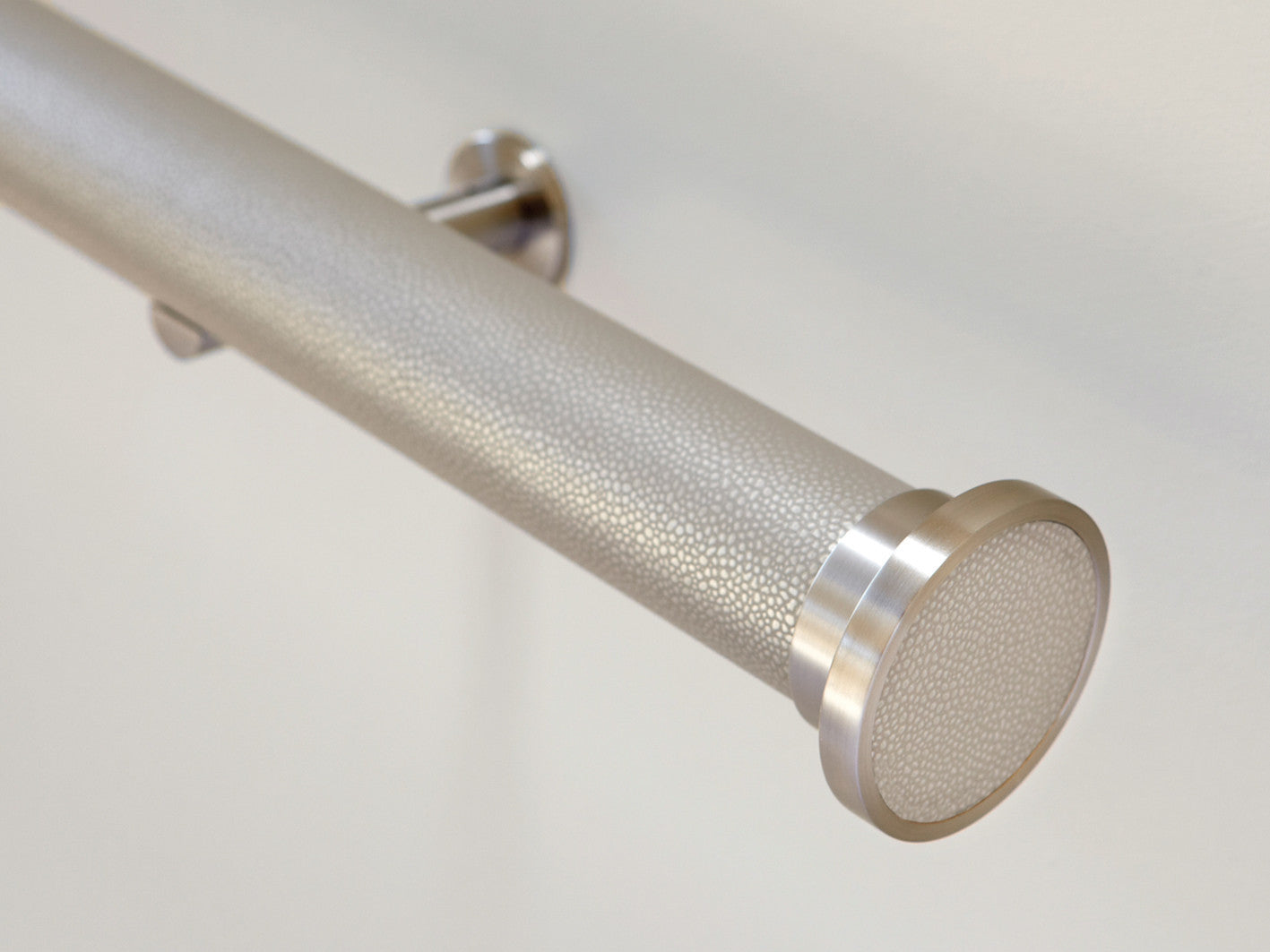 disc finial on 50mm wrapped and tracked pebble curtain pole