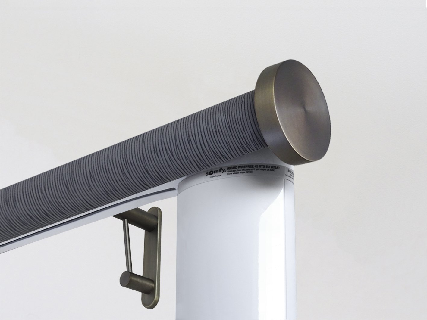 Motorised electric curtain pole in flint blue, wireless & battery powered using the Somfy Glydea track | Walcot House UK curtain pole specialists