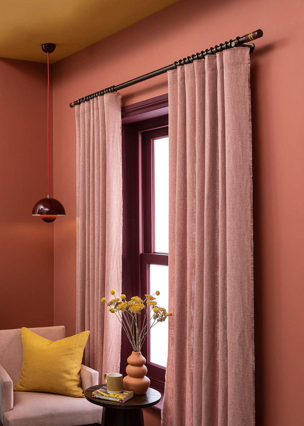 Brushed bronze curtain pole with handmade bobbin finials in vibrant colours | Walcot House UK