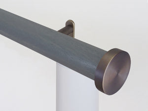 Motorised wooden curtain pole in dark blue grey stain and bronze hardware | Walcot House UK
