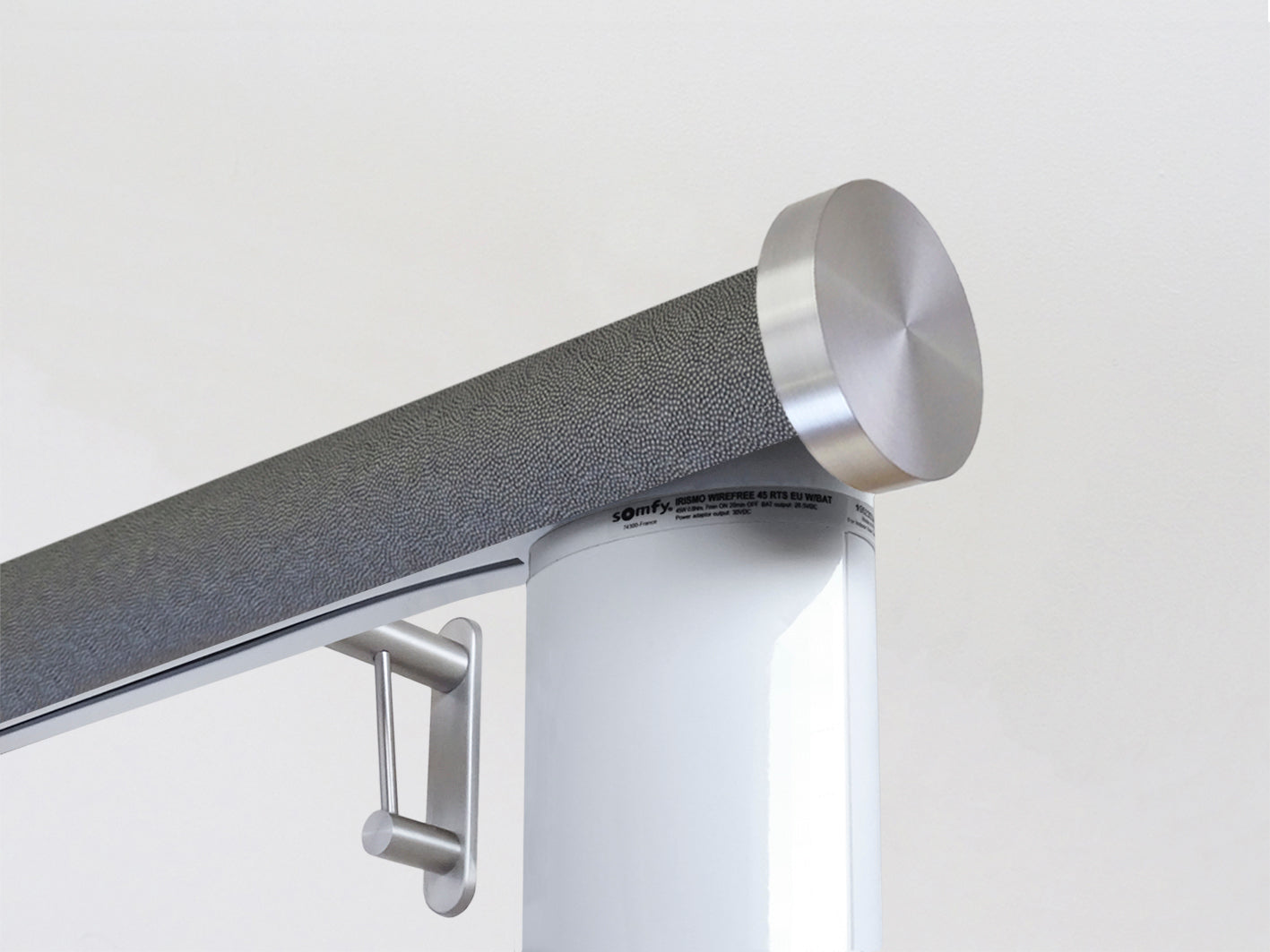 Motorised curtain pole in 50mm dia. black pepper wrap