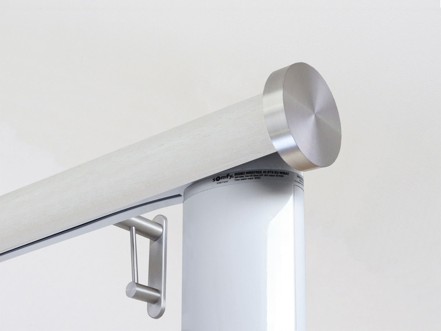 Motorised wooden curtain pole in white stain and antique brass hardware | Walcot House UK