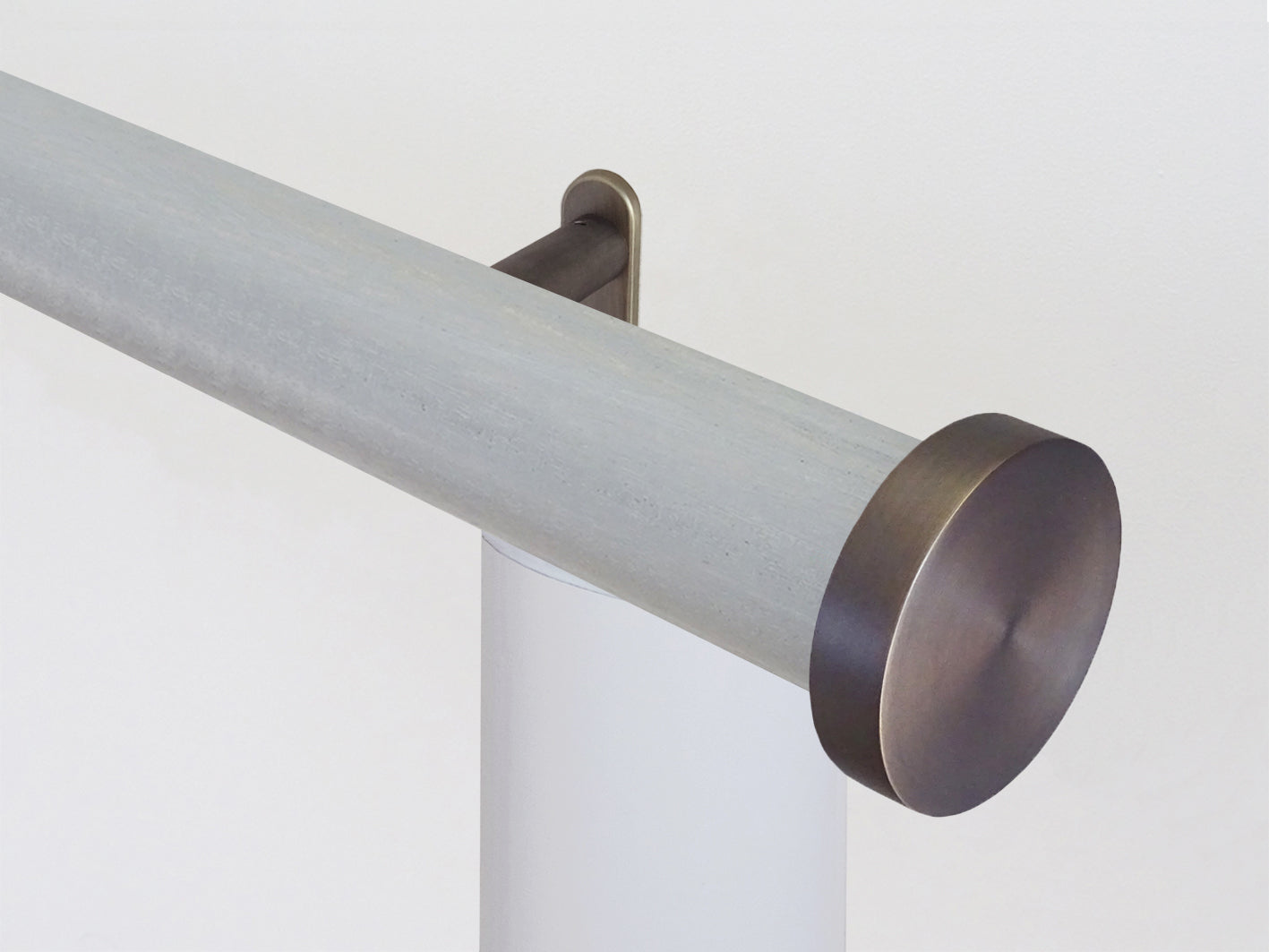 Motorised wooden curtain pole in light blue stain and bronze hardware | Walcot House UK