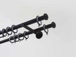 Walcot House | Designer black metal double curtain pole set with simple and classic elliptical finials