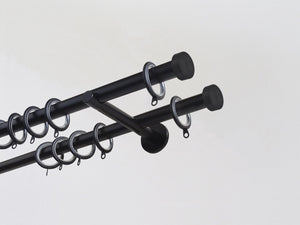 Walcot House | Designer black metal double curtain pole set with clean and modern mini disc finials