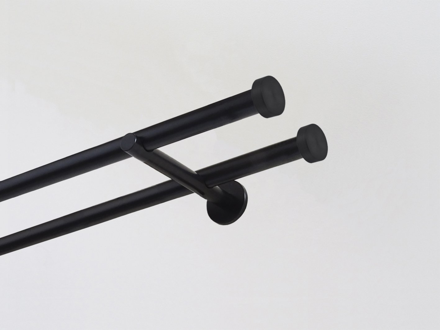 Walcot House | Designer black metal double curtain pole set with clean and modern mini disc finials