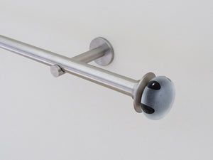 Designer stainless steel curtain pole set with coloured glass lunar finials in black | Walcot House