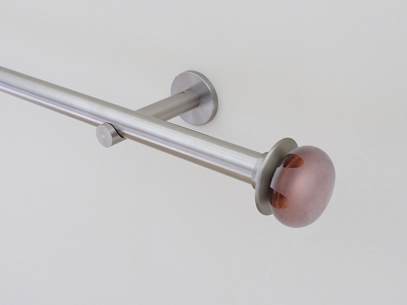 Designer stainless steel curtain pole set with coloured glass lunar finials in bronze | Walcot House