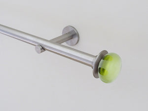 Designer stainless steel curtain pole set with coloured glass lunar finials in leaf green | Walcot House