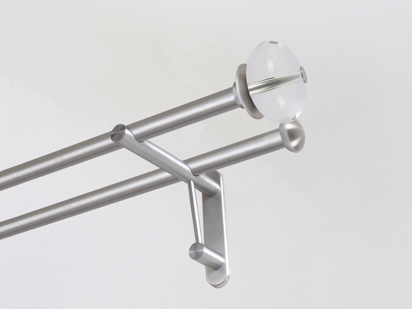 Walcot House | 19mm diameter stainless steel metal curtain pole with acrylic ellipse finials