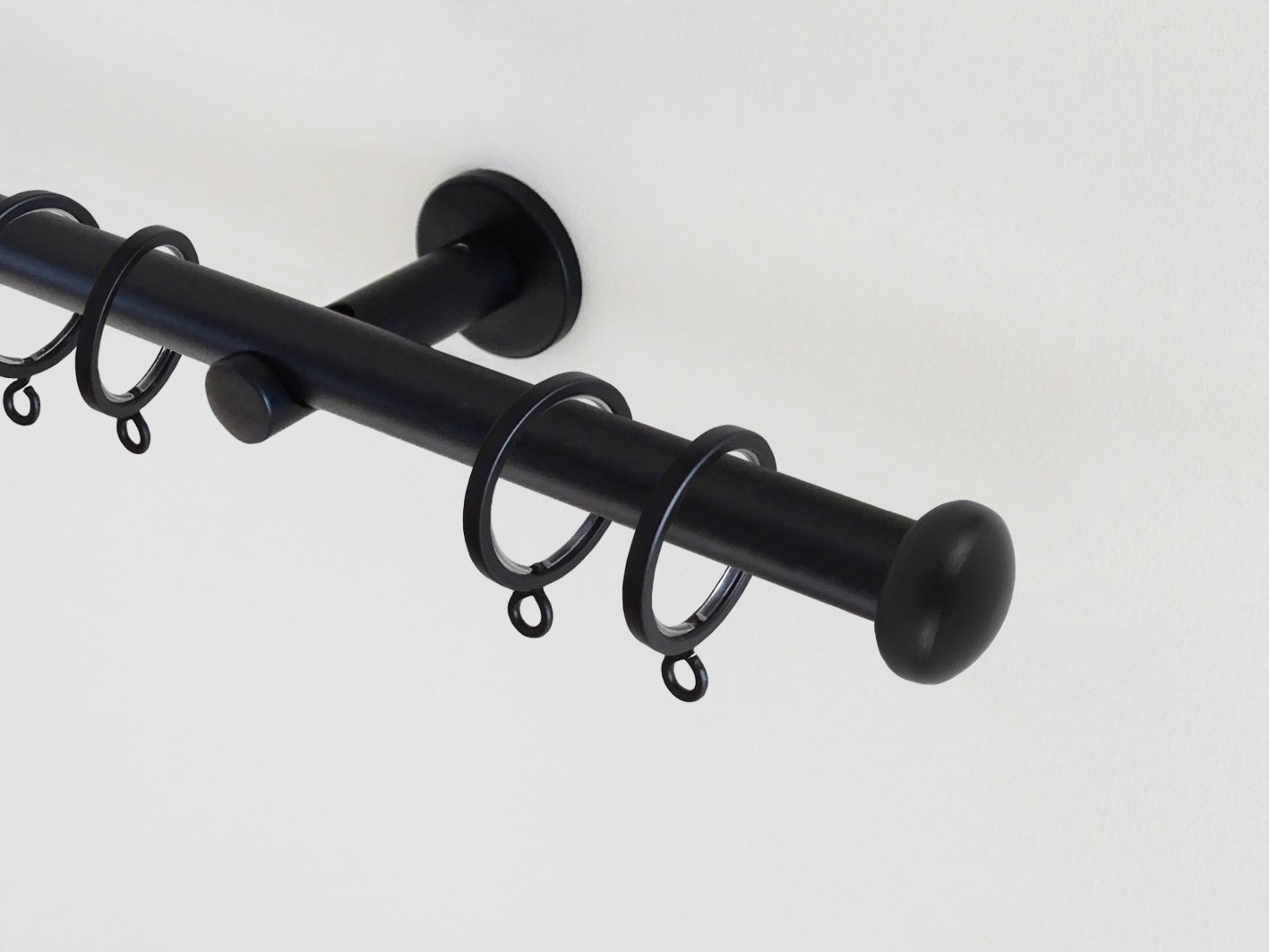19mm skinny black curtain rod set with elliptical end