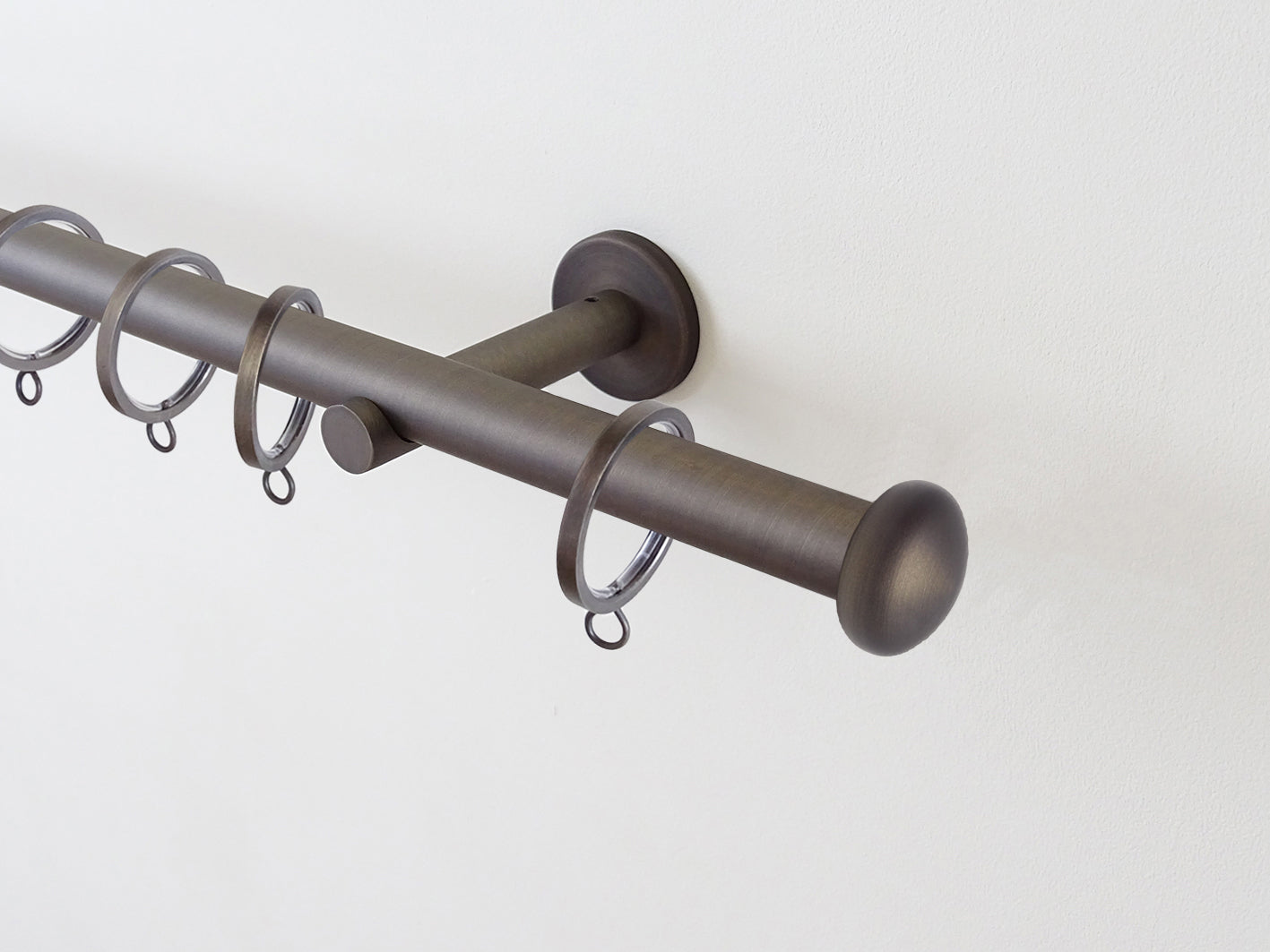19mm dia. brushed bronze metal curtain pole set with elliptical finials