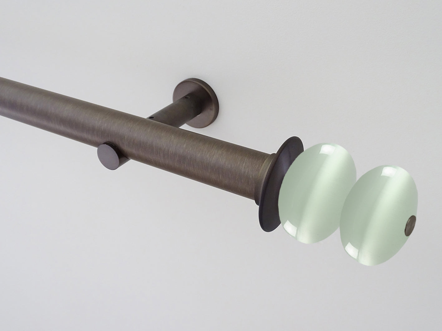 Antique brass curtain pole set with glass moonstone finials | Walcot House