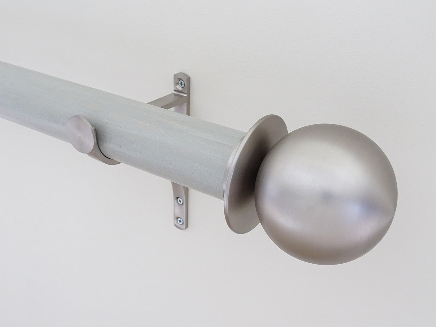 Metal ball finial in brushed steel, mounted on 50mm "wood pidgeon" stained wood pole set