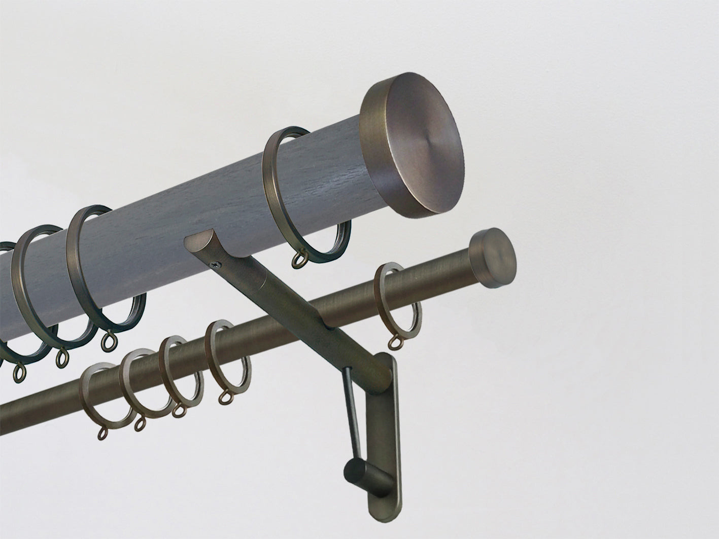 Sseal grey stained wooden double curtain pole by Walcot House with brushed bronze hardware