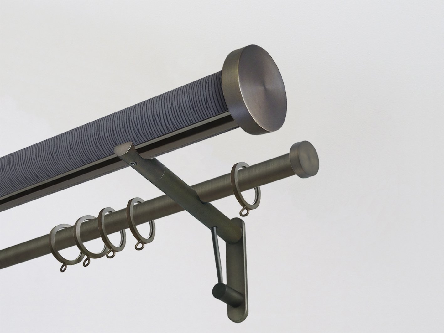 wrapped & tracked double curtain pole set in dark blue strata "flint" by Walcot House