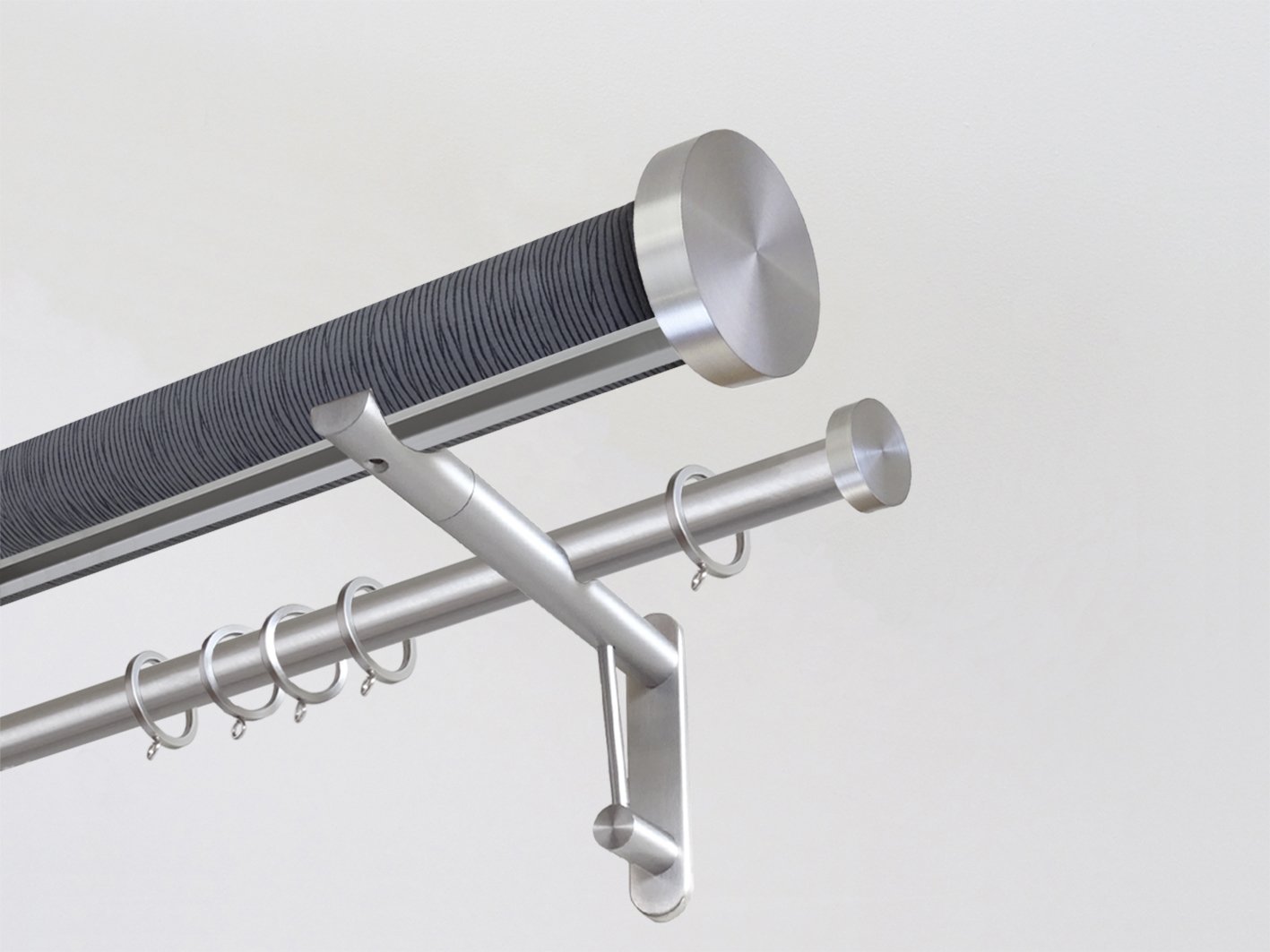 wrapped & tracked double curtain pole set in dark blue strata "flint" by Walcot House