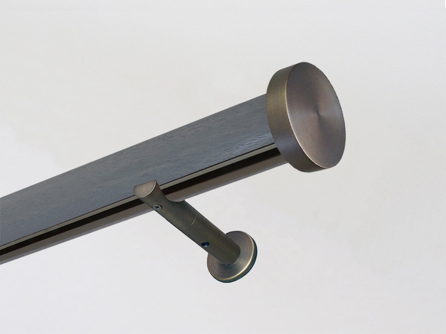 Seal stained wooden tracked curtain pole bronze track by Walcot House