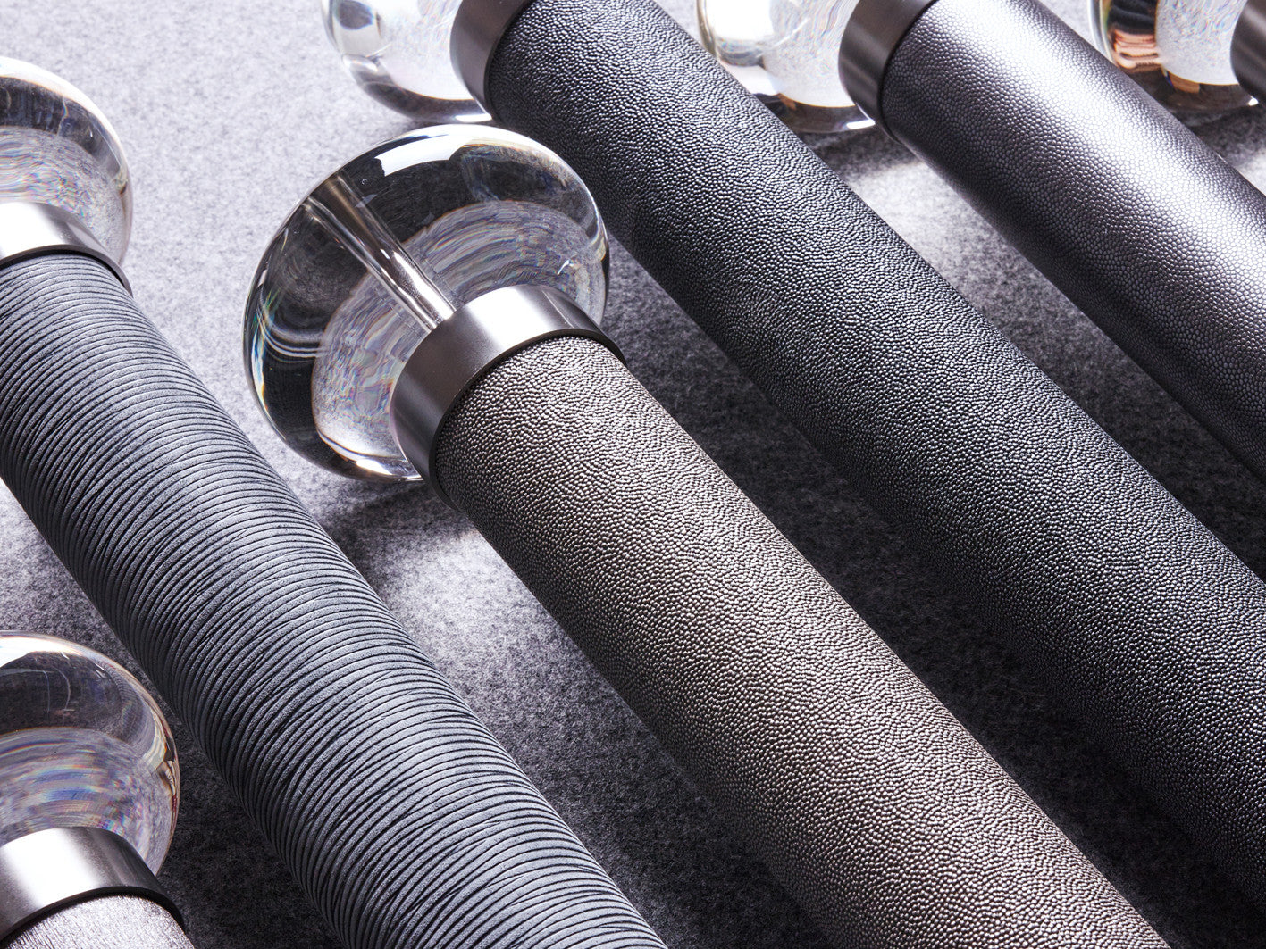 50mm diameter wrapped and tracked dusk pole with acrylic ellipse finials