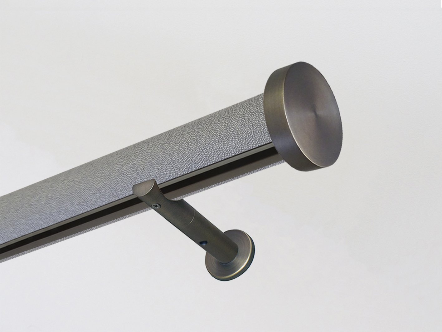 shagreen textured wrapped and tracked dusk curtain pole bronze track by Walcot House