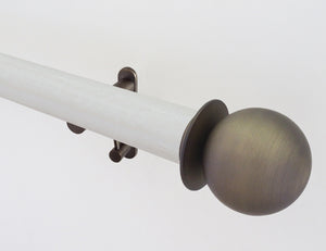 White wooden curtain pole in ecru with track inserted and steel ball finials