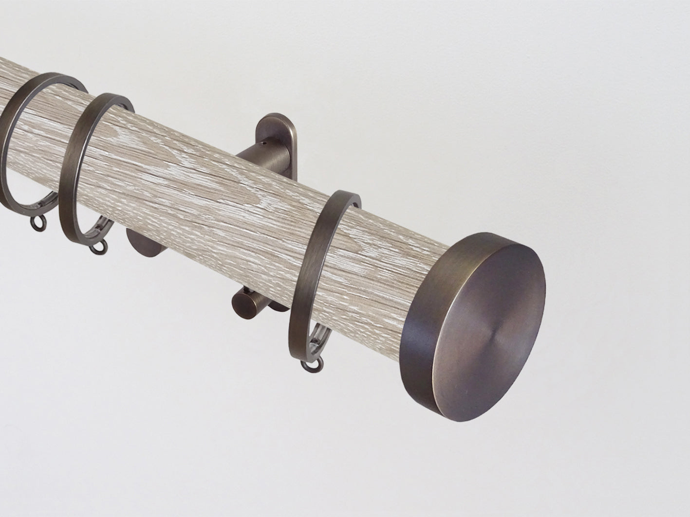 Walcot House | Real solid limed oak curtain pole set in 50mm, hand finished, bronze hardware