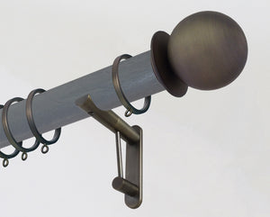 50mm diameter stained wooden curtain pole with bronze metal ball finials and bronze brackets