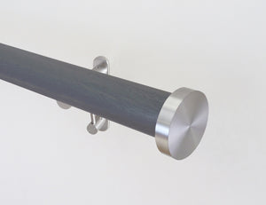 Dark grey tracked curtain pole with end cap finials