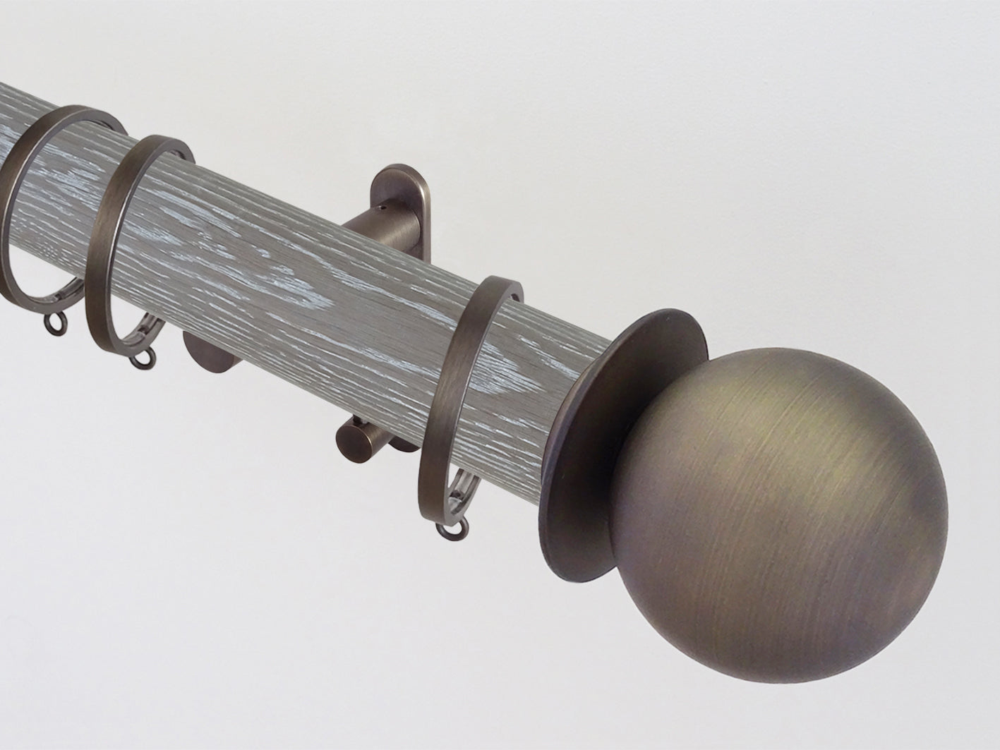 Walcot House | Real solid limed oak curtain pole set in 50mm, hand finished, bronze hardware