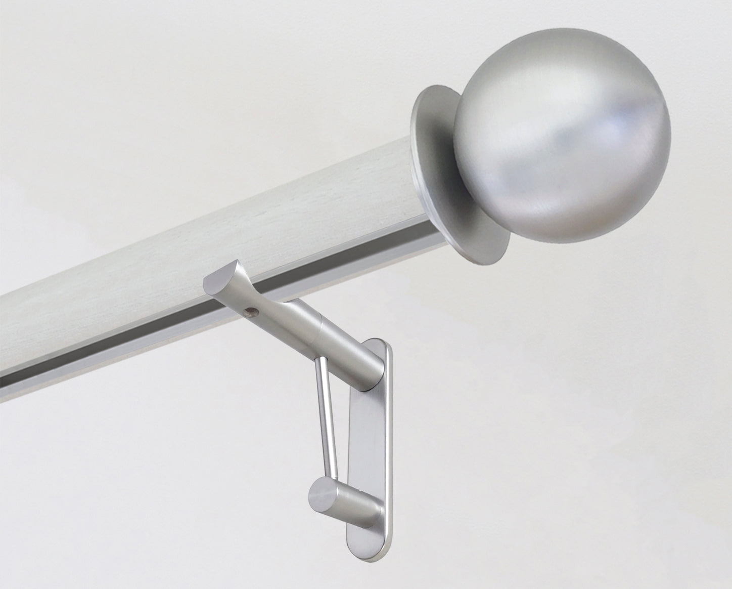 White wooden curtain pole in ecru with track inserted and steel ball finials