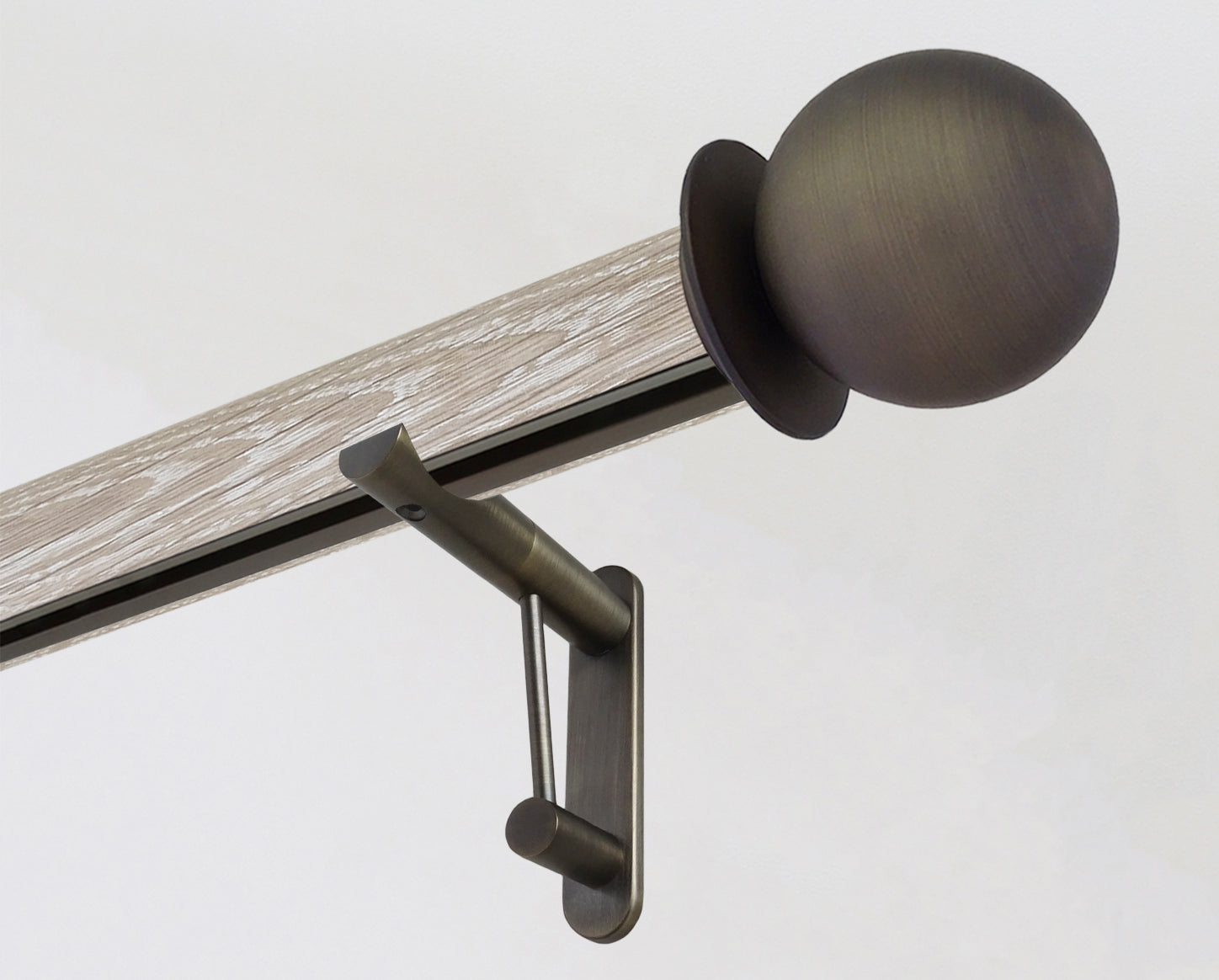 Real solid limed oak tracked curtain pole with metal ball finials | Walcot House
