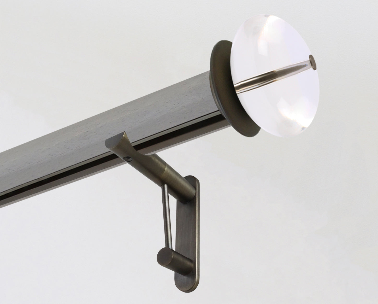 Mouse stained grey wooden tracked curtain pole with acrylic finials