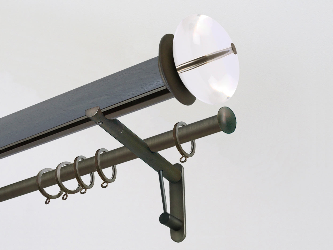 Seal stained wooden tracked curtain pole with acrylic finials and brushed bronze detail