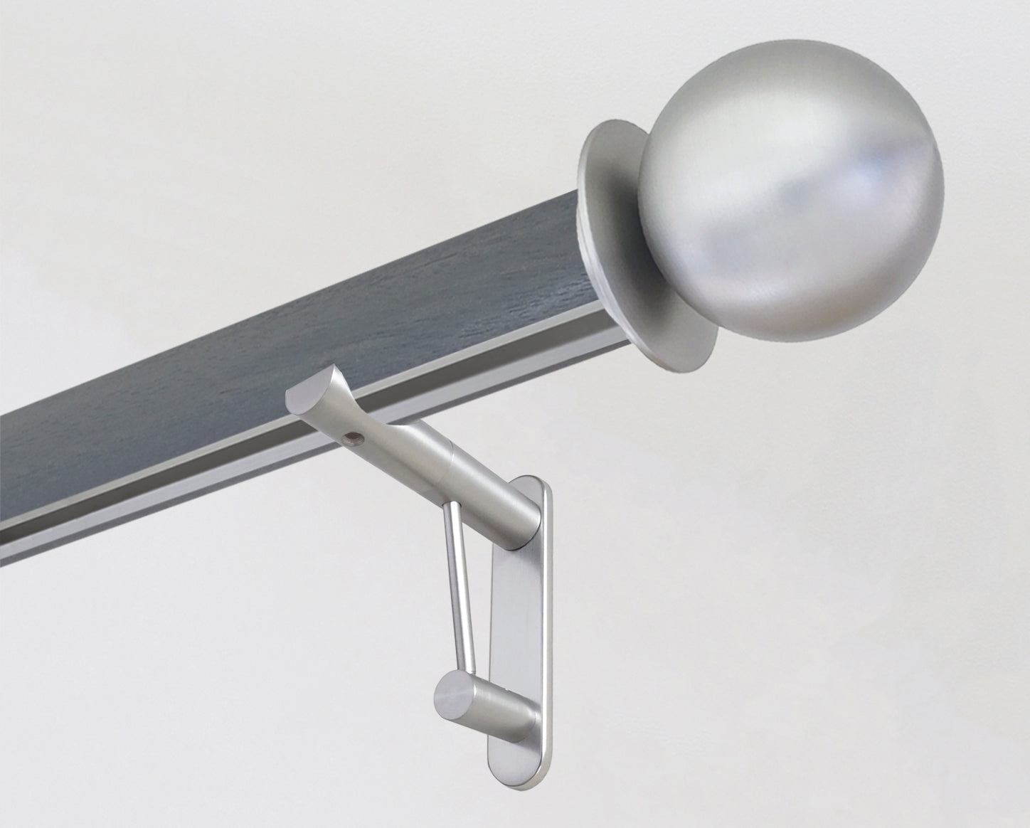Dark grey tracked curtain pole with bronze ball finials