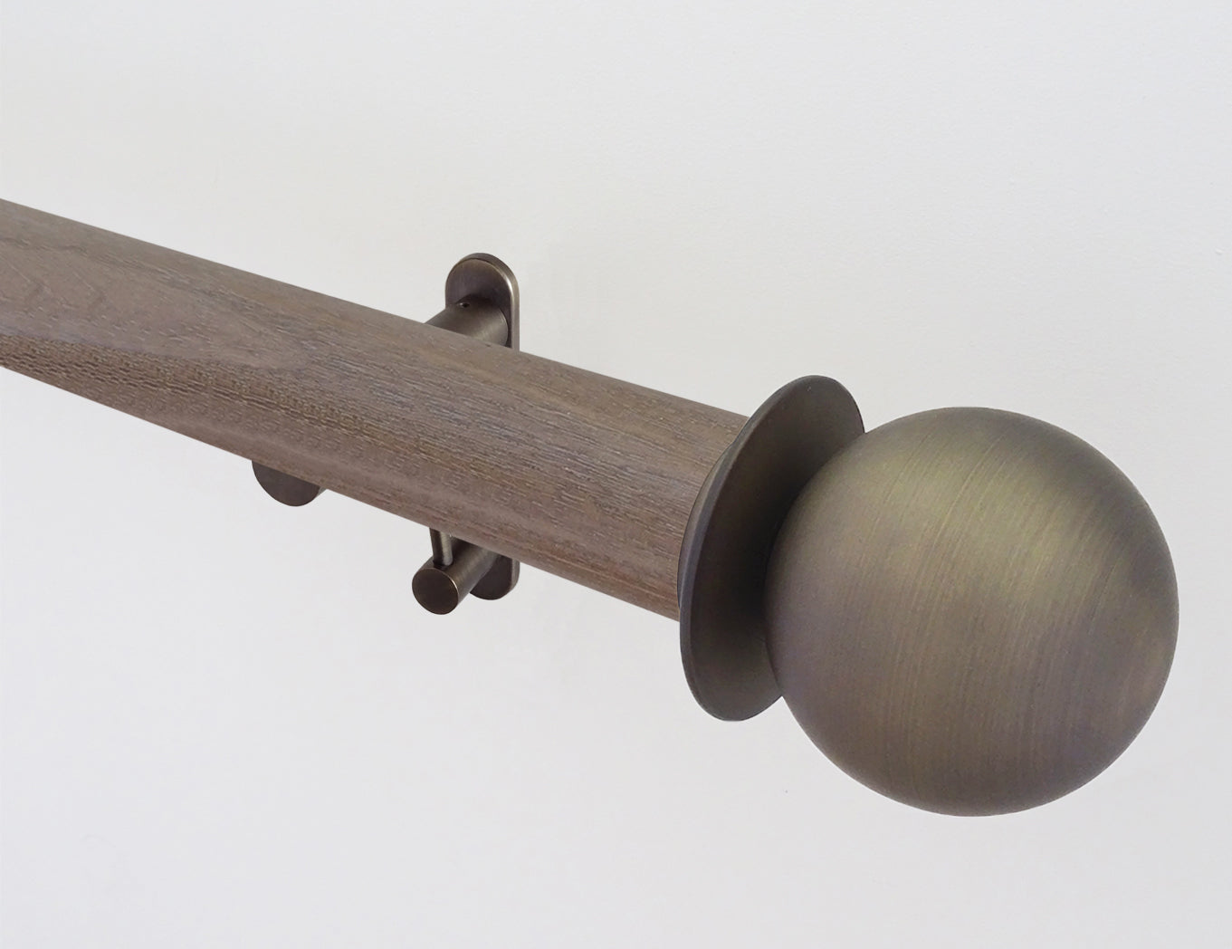 weathered oak wooden tracked pole with bronze ball finials