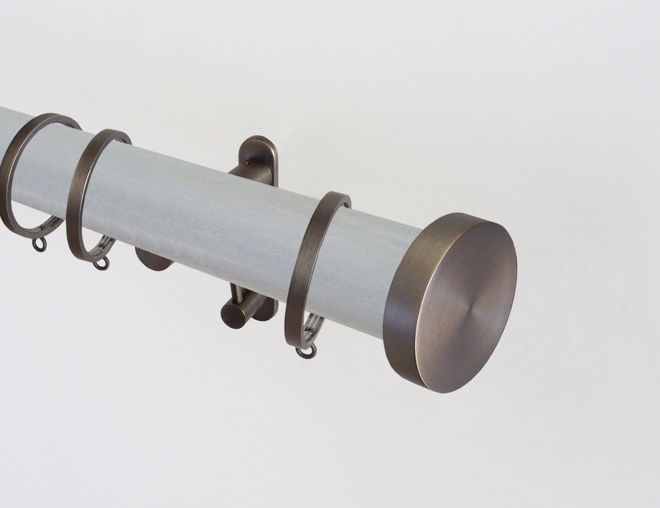 wood pigeon stained wooden curtain pole by Walcot House