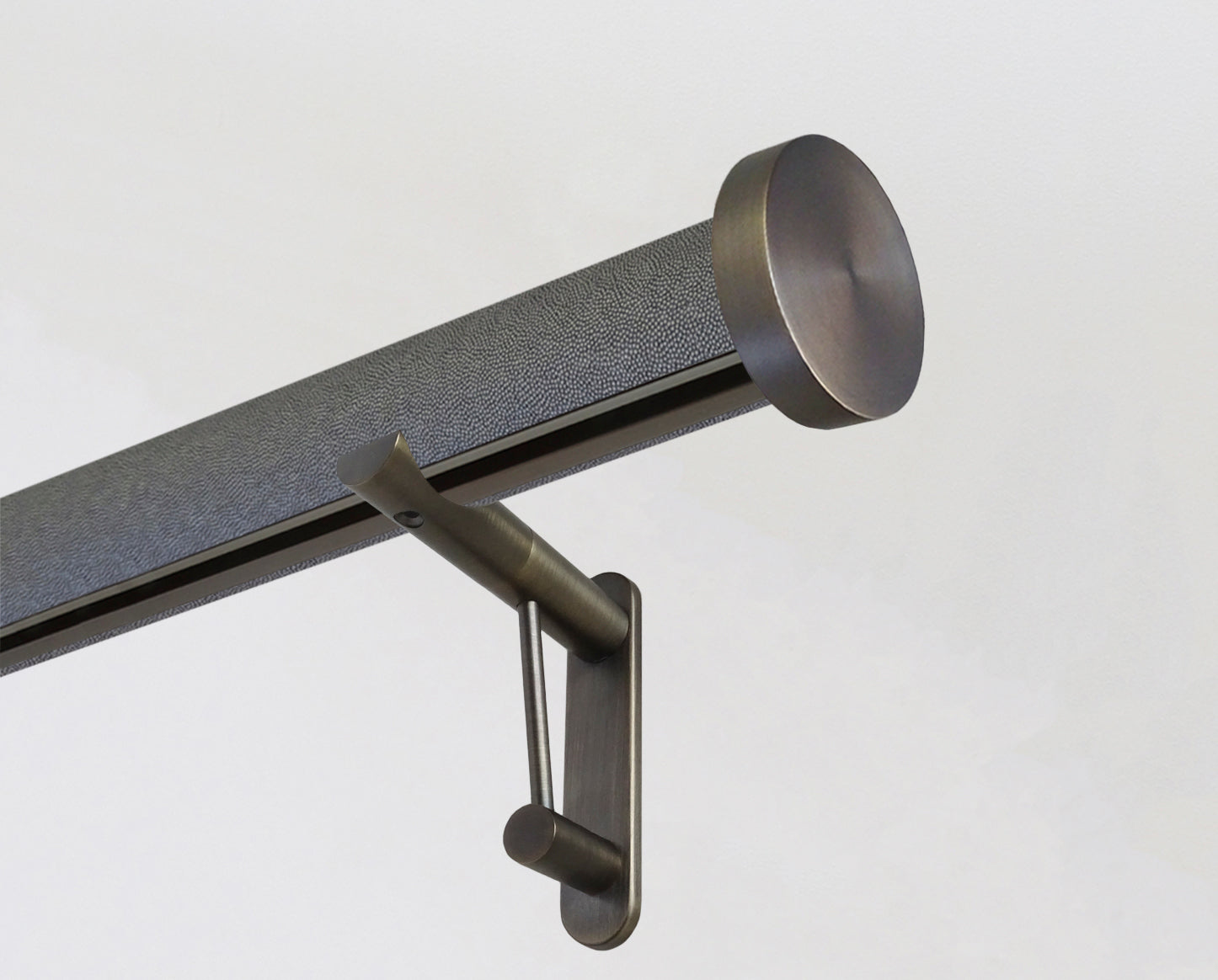 wrapped & tracked curtain pole set in shagreen textured "black pepper" by Walcot House