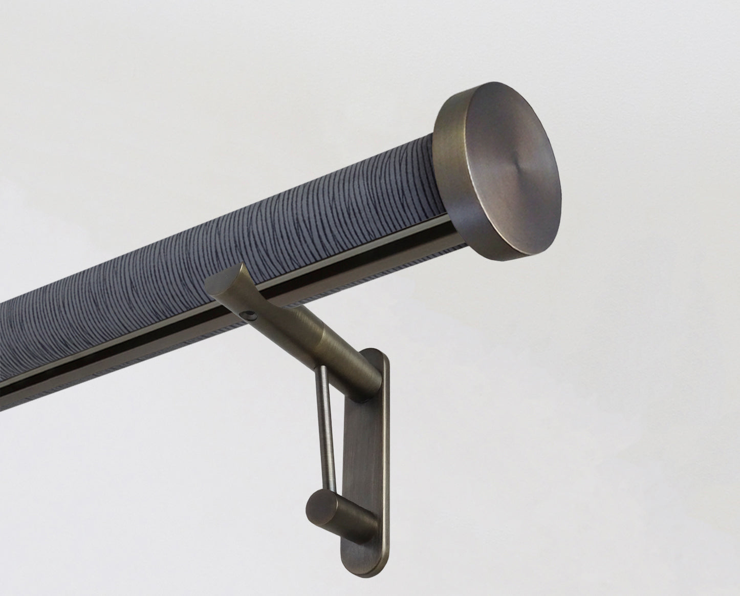 wrapped & tracked curtain pole set in dark blue strata "flint" by Walcot House