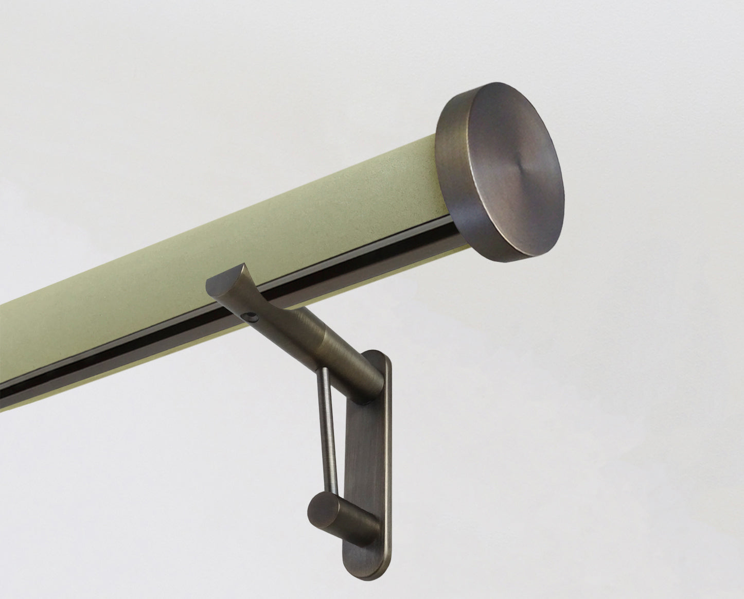 wrapped & tracked curtain pole set in green suede "new acorn" by Walcot House