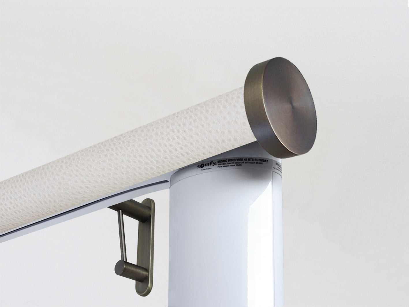 Motorised electric curtain pole in white ostrich, wireless & battery powered using the Somfy Glydea track | Walcot House UK curtain pole specialists