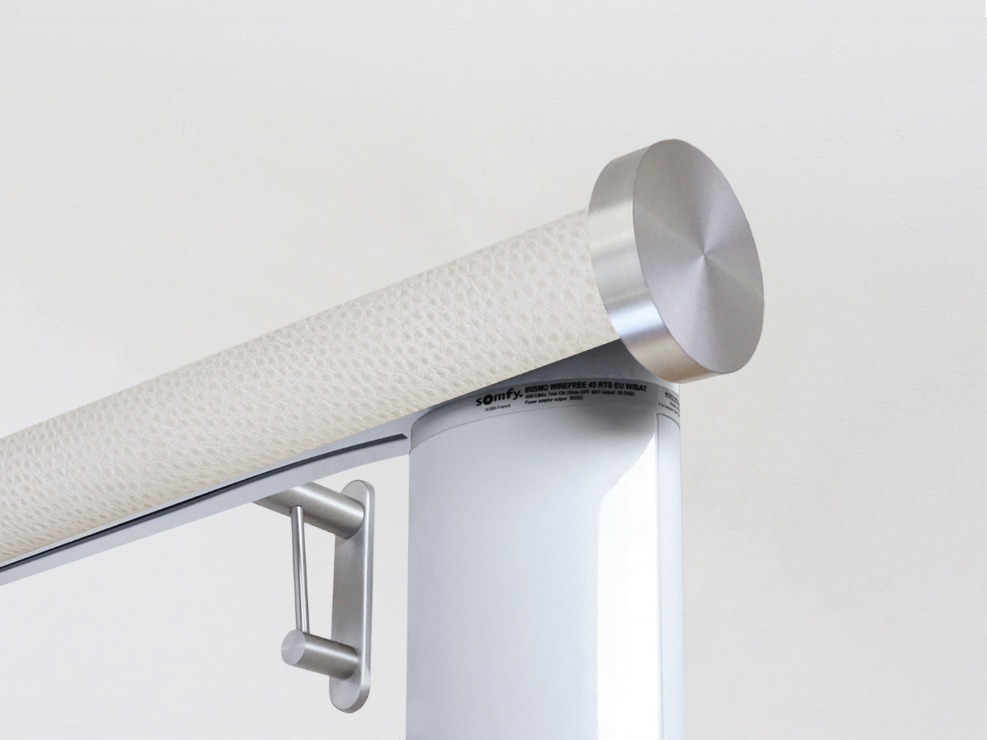 Motorised electric curtain pole in white ostrich, wireless & battery powered using the Somfy Glydea track | Walcot House UK curtain pole specialists