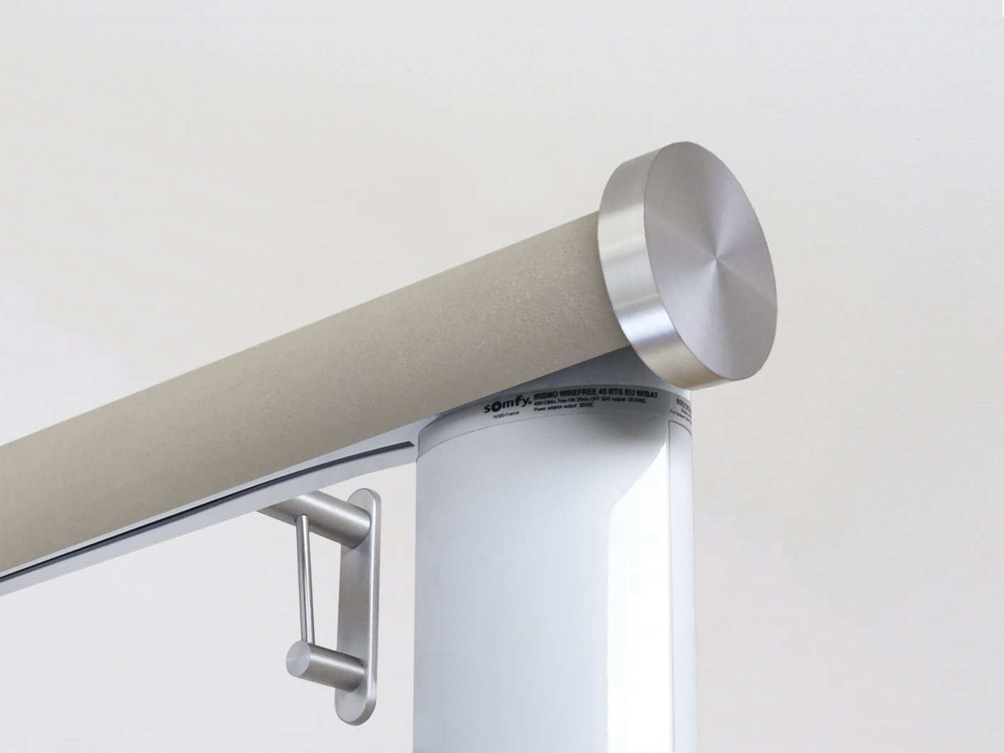 Motorised electric curtain pole in fawn beige suede, wireless & battery powered using the Somfy Glydea track | Walcot House UK curtain pole specialists