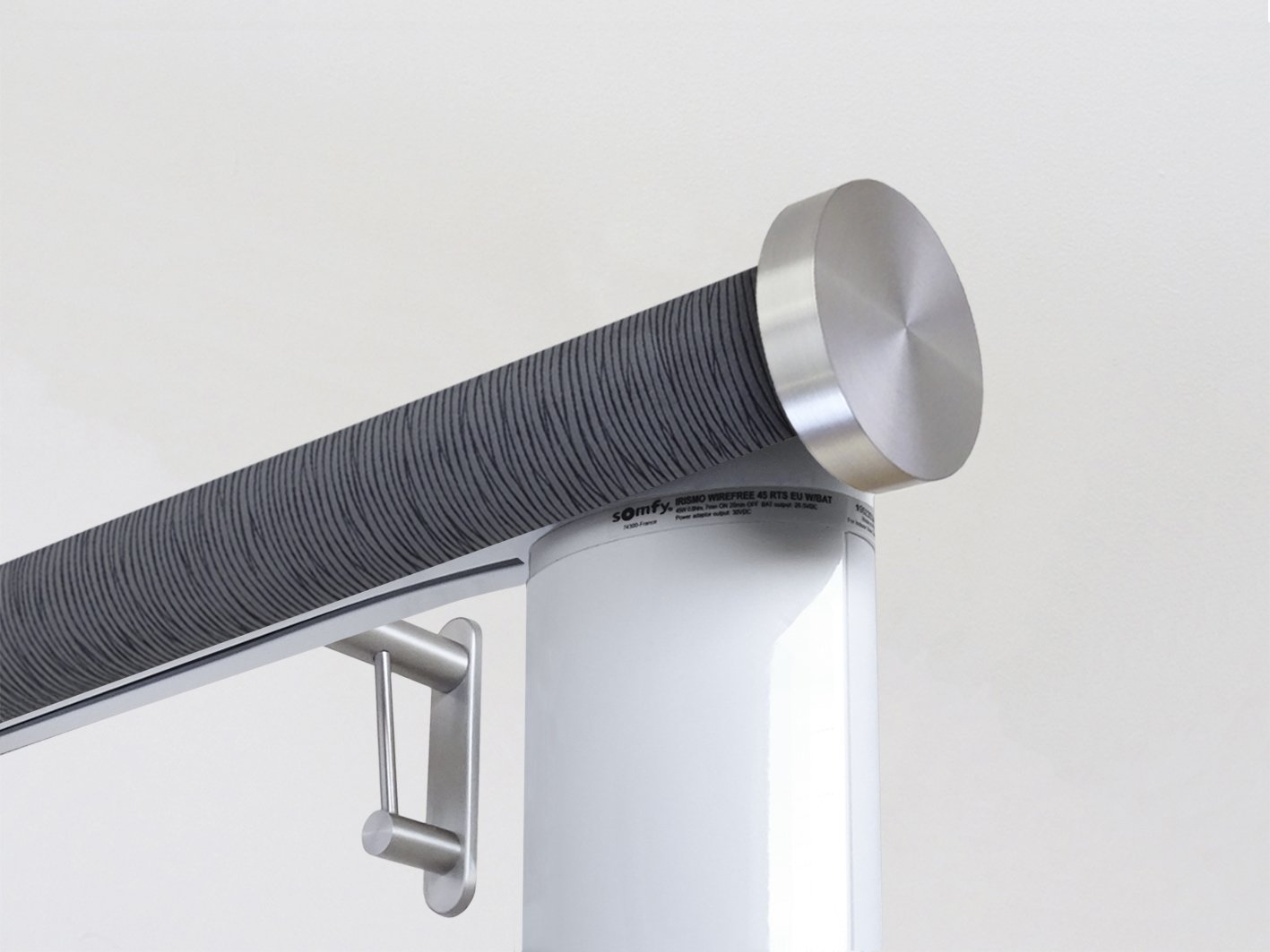 Motorised electric curtain pole in flint blue, wireless & battery powered using the Somfy Glydea track | Walcot House UK curtain pole specialists