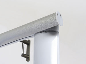 Motorised electric curtain pole in pebble grey, wireless & battery powered using the Somfy Glydea track | Walcot House UK curtain pole specialists