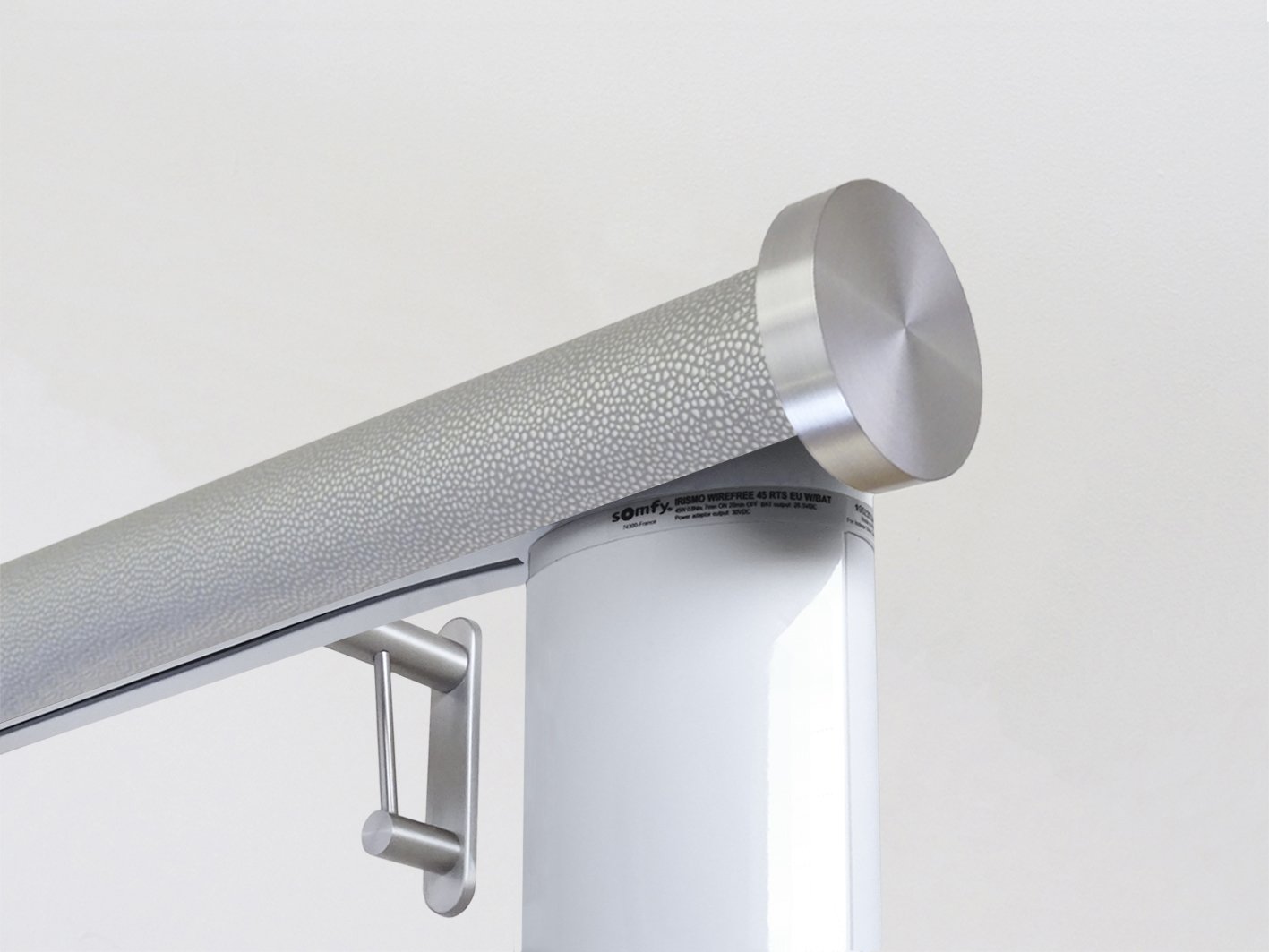 Motorised electric curtain pole in pebble grey, wireless & battery powered using the Somfy Glydea track | Walcot House UK curtain pole specialists