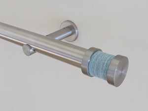 Groove finial in stainless steel with "Mist" twine mounted on 30mm curtain pole