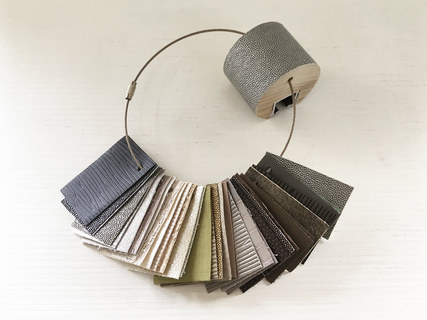 50mm dia. wrapped and tracked curtain pole samples on a wire key chain